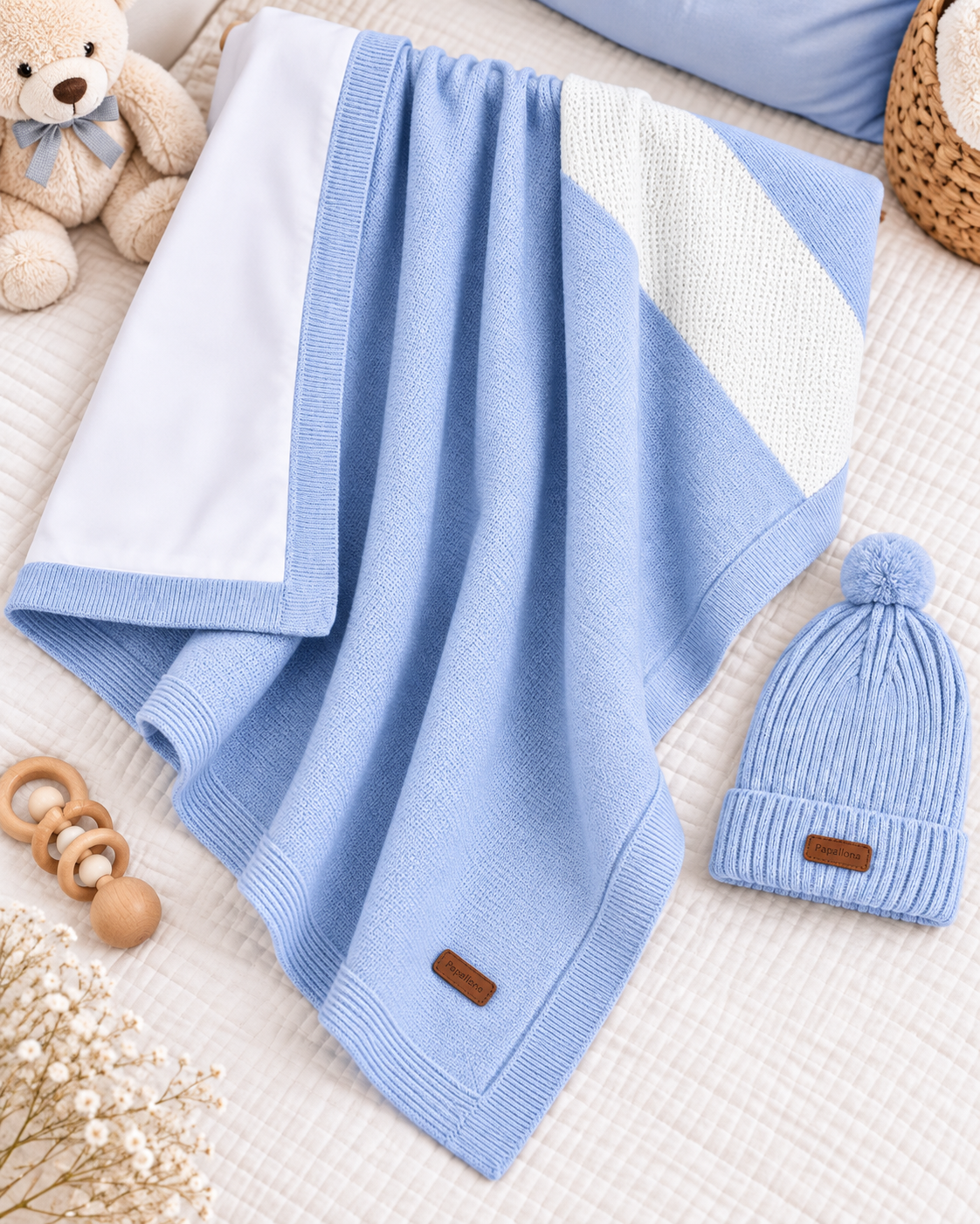 Couverture bébé en tricot avec bonnet